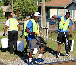 People picking up litter